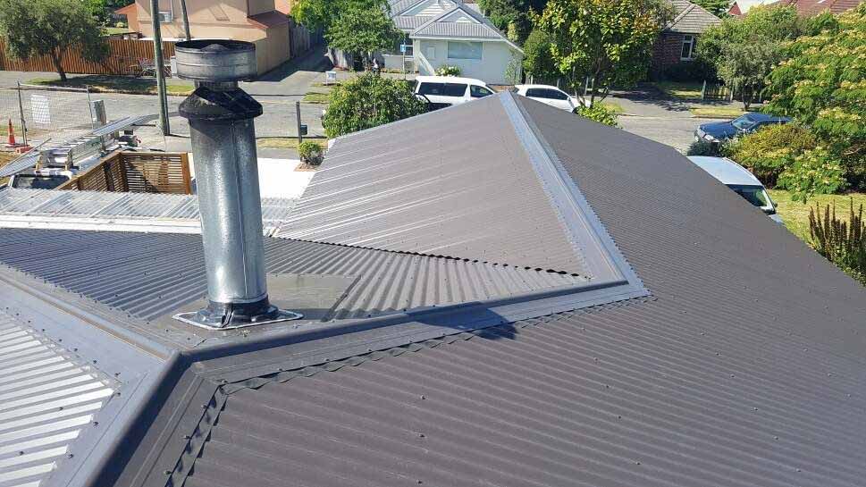 Long-Run metal roofing installed by Huston Cross
